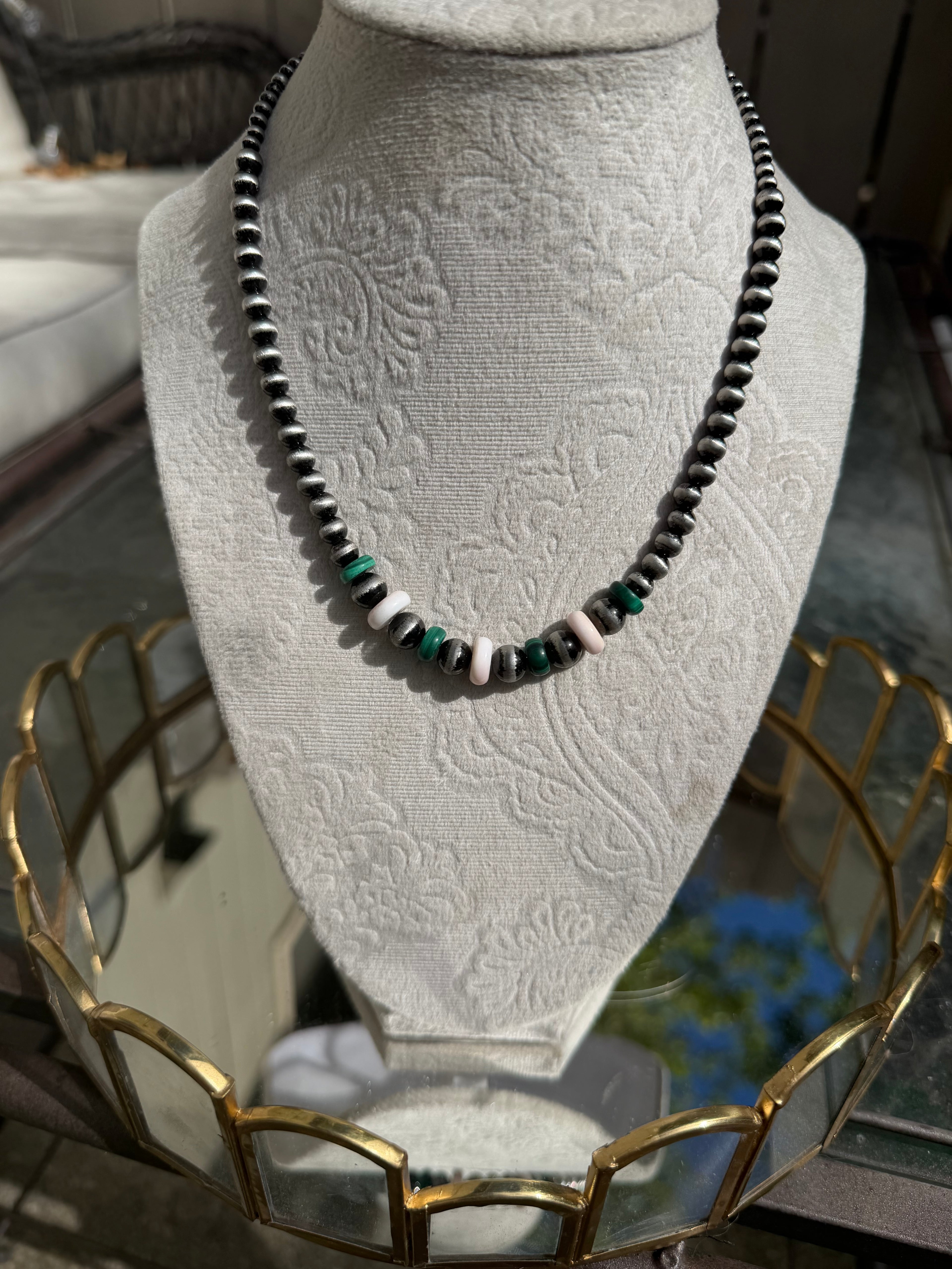 malachite and pink conch beaded necklace
