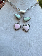 Pink conch and green veriscite cherries