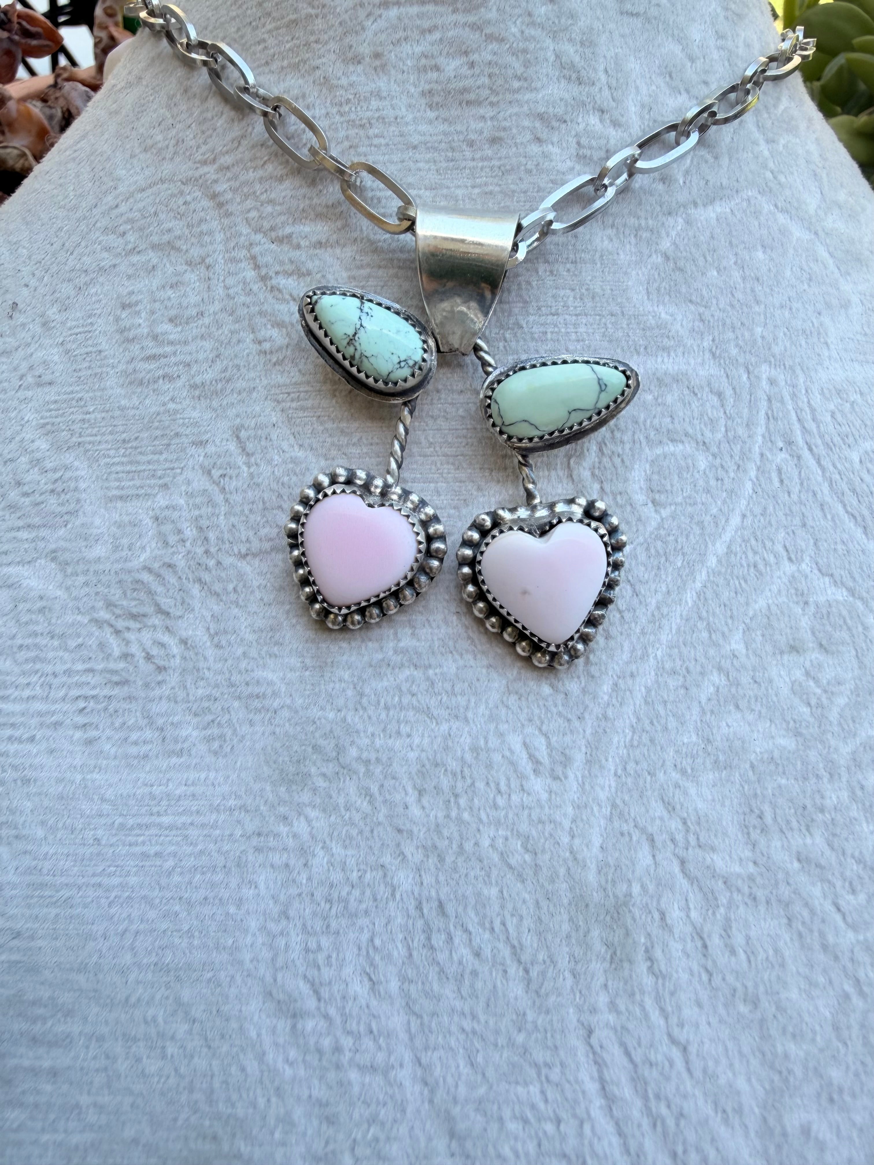 Pink conch and green veriscite cherries