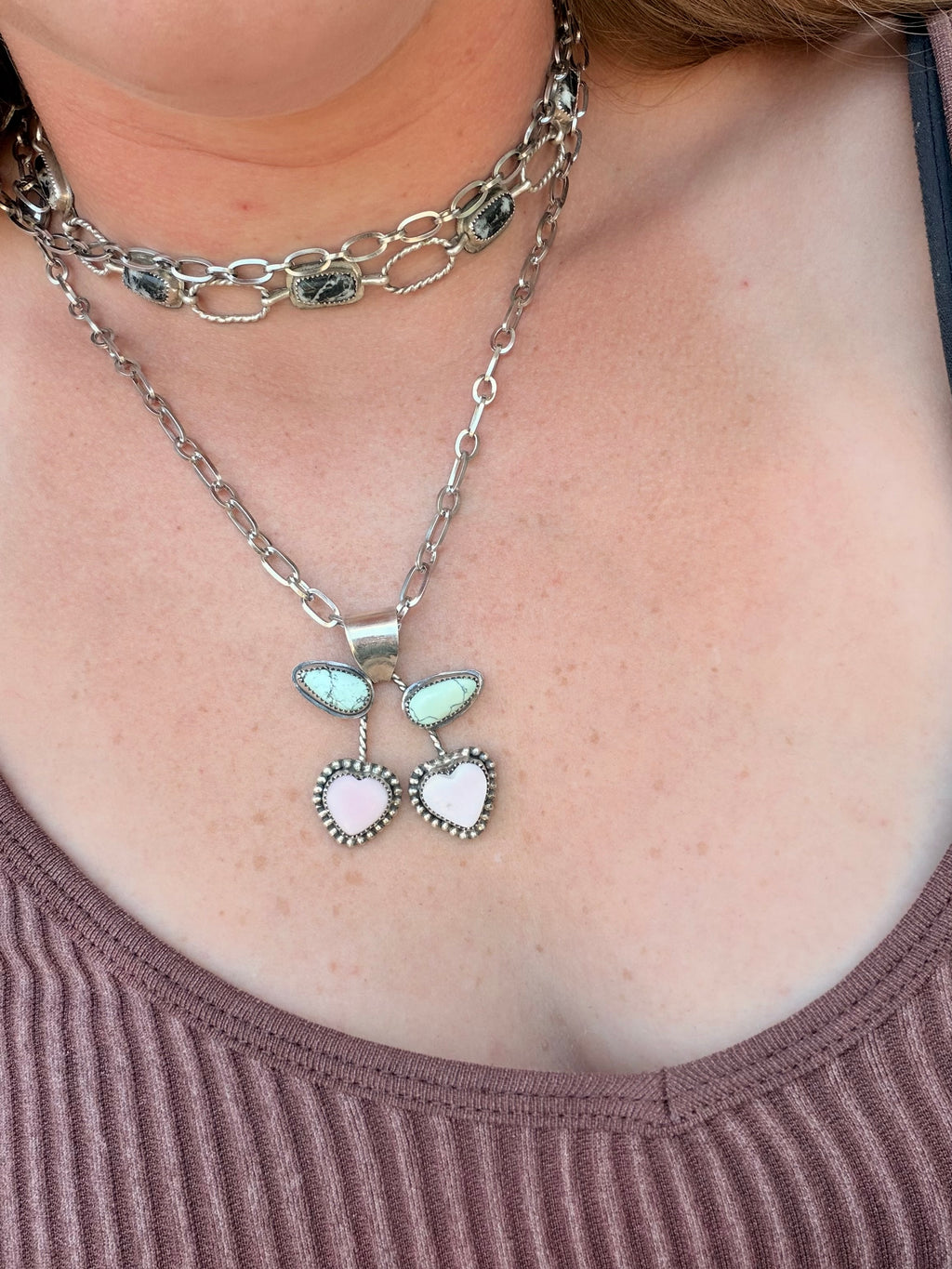 Pink conch and green veriscite cherries