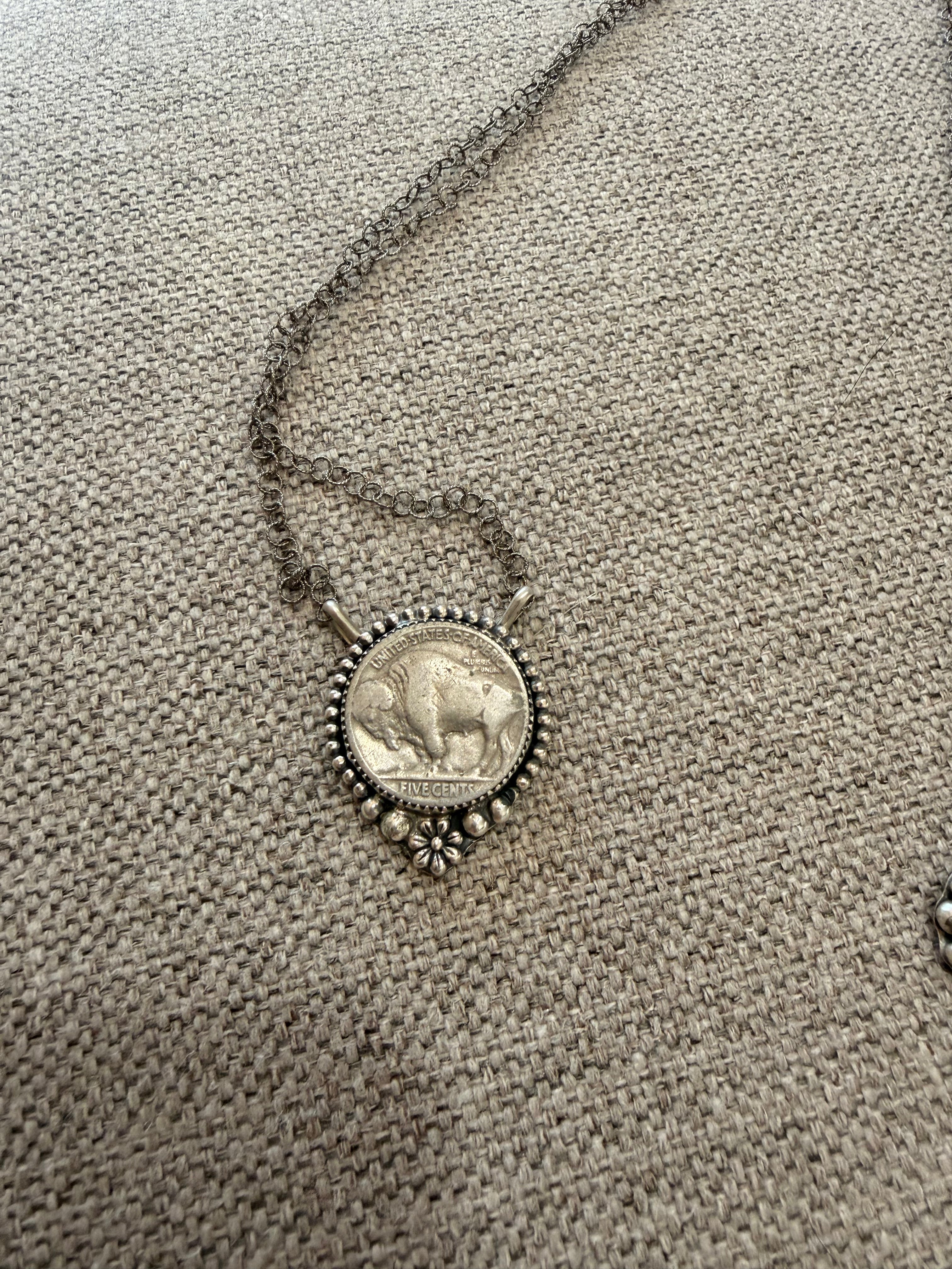 Buffalo coin with flower