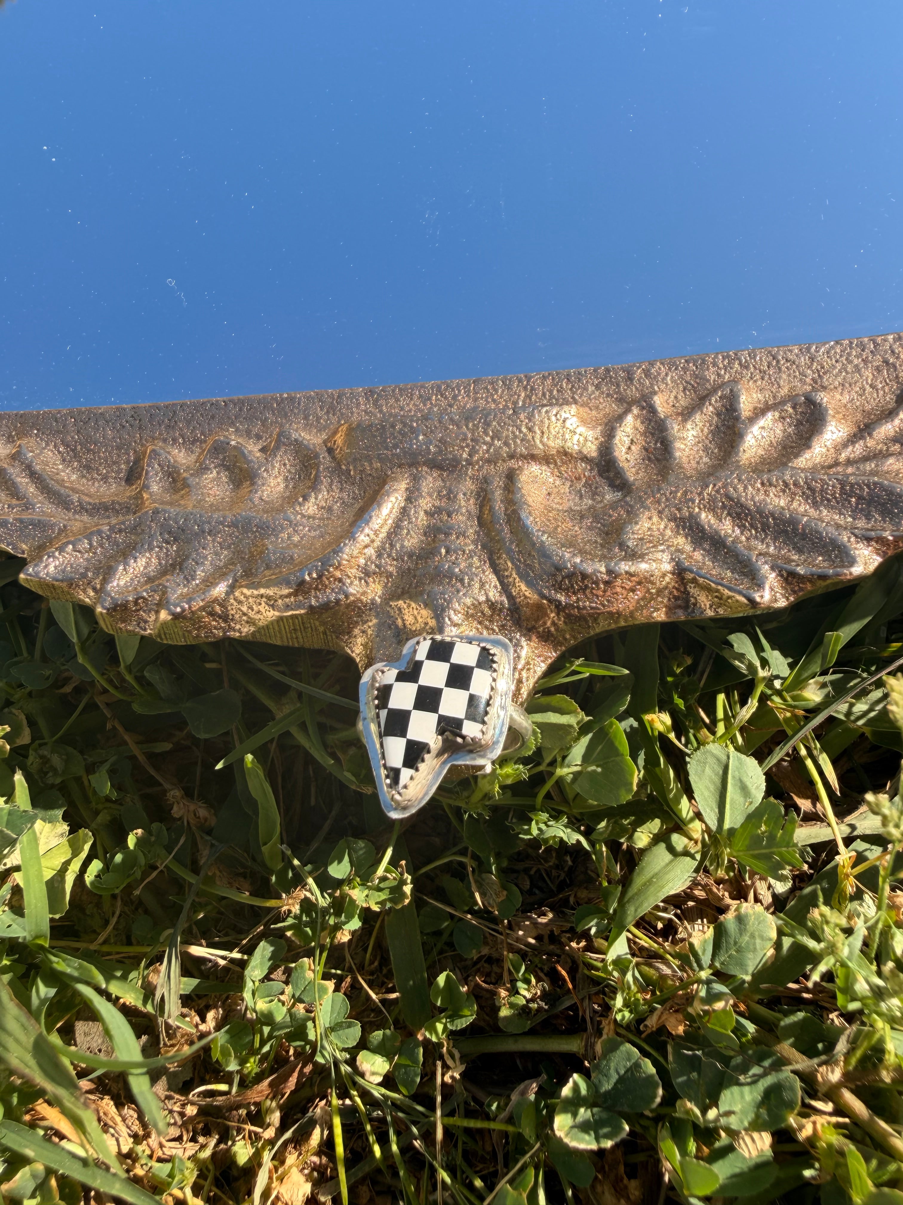 Black checkered lightning bolt ring