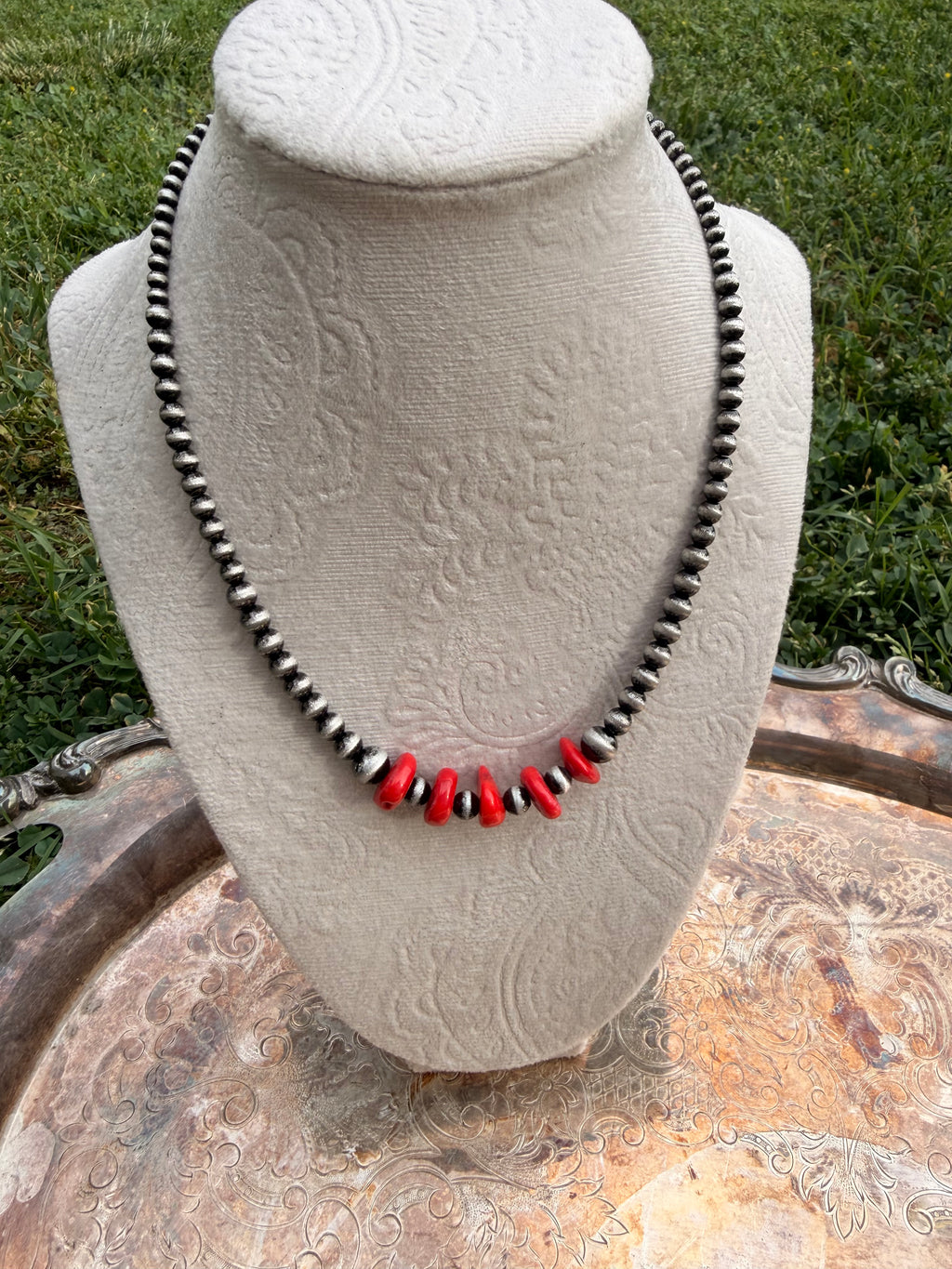 red coral and stainless steel graduated beaded necklace