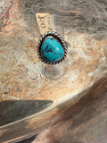 rough shape turquoise ring with roping