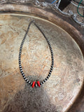 red coral and stainless steel graduated beaded necklace