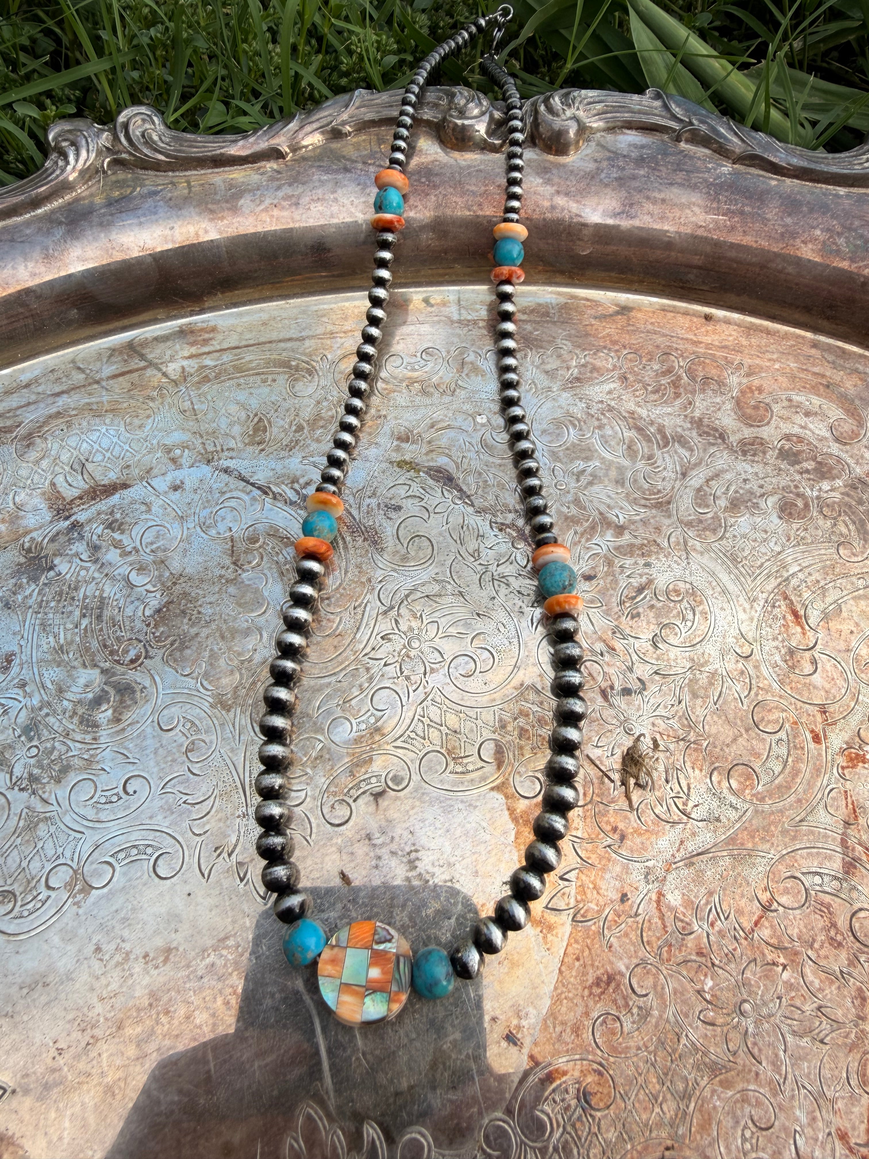 turquoise and spiny oyster with checkered beaded necklace