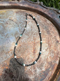 pink conch and turquoise beaded necklace