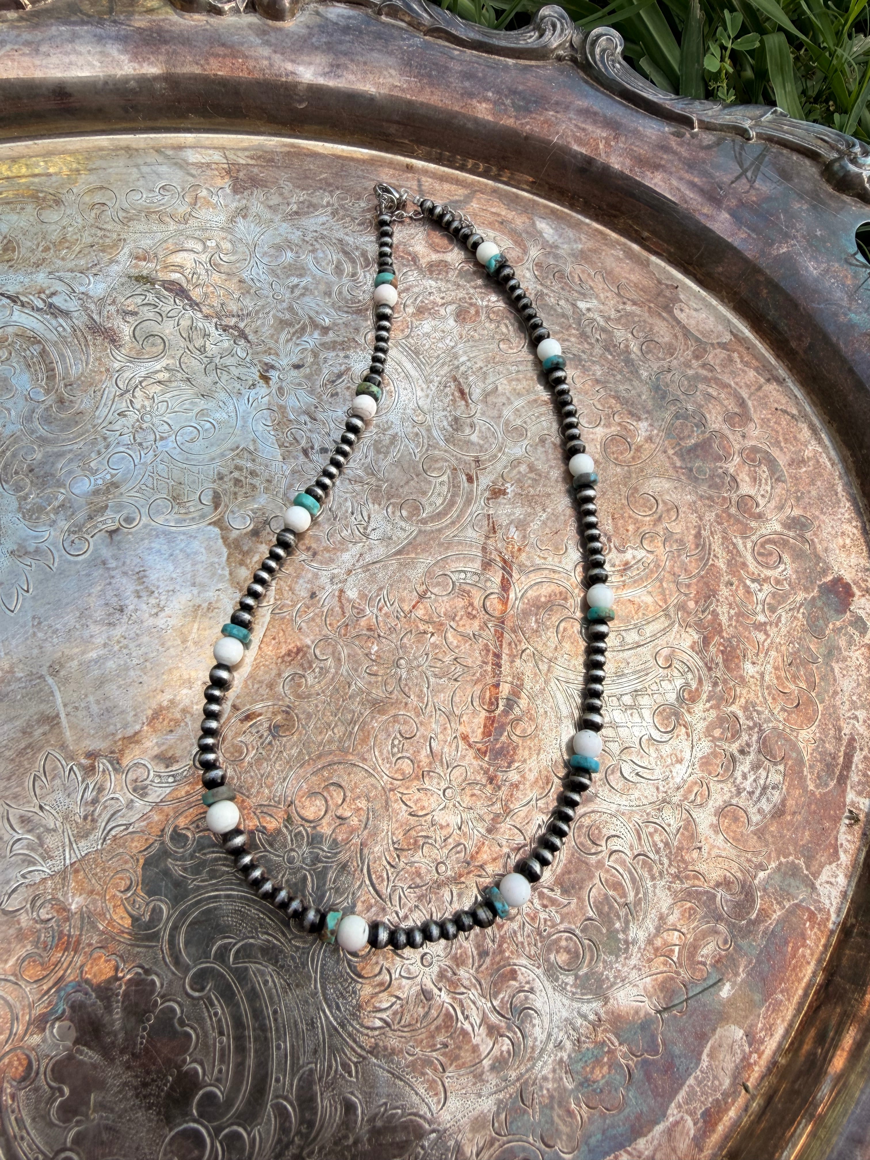 pink conch and turquoise beaded necklace