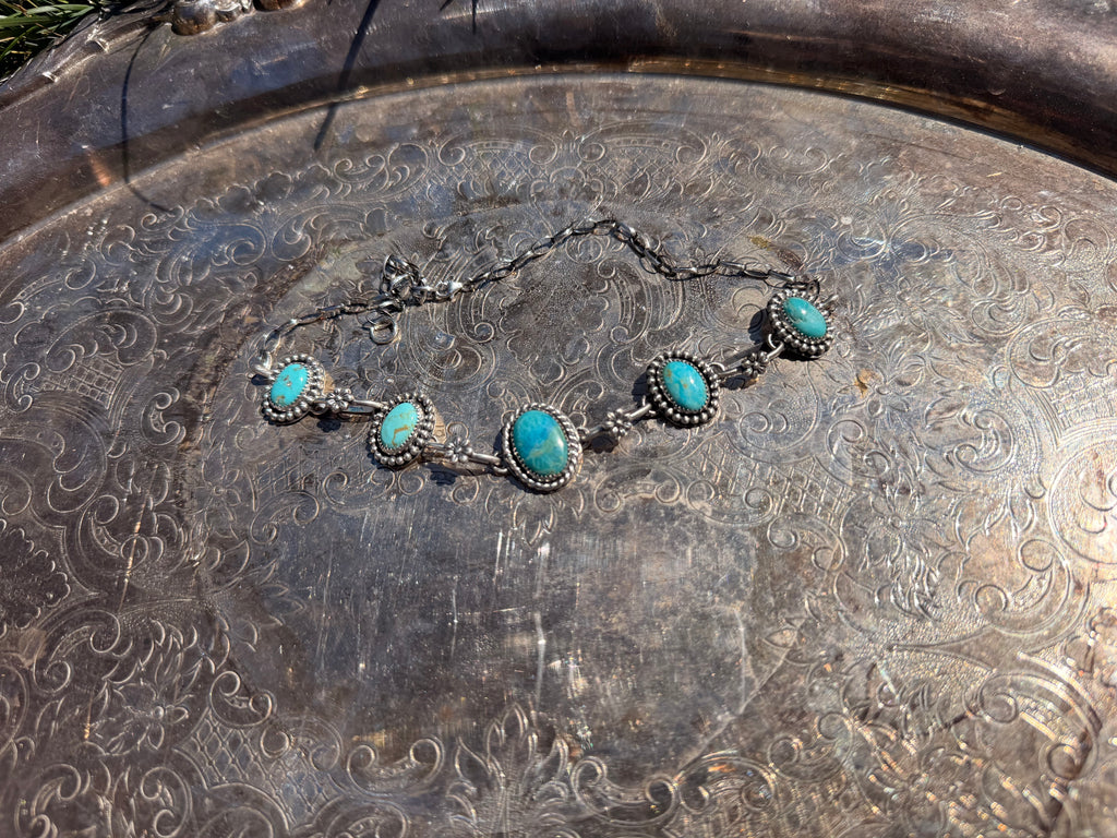 turquoise choker with flower details