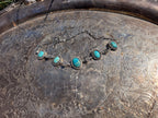 turquoise choker with flower details