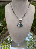 white Buffalo and Turquoise heart pendant