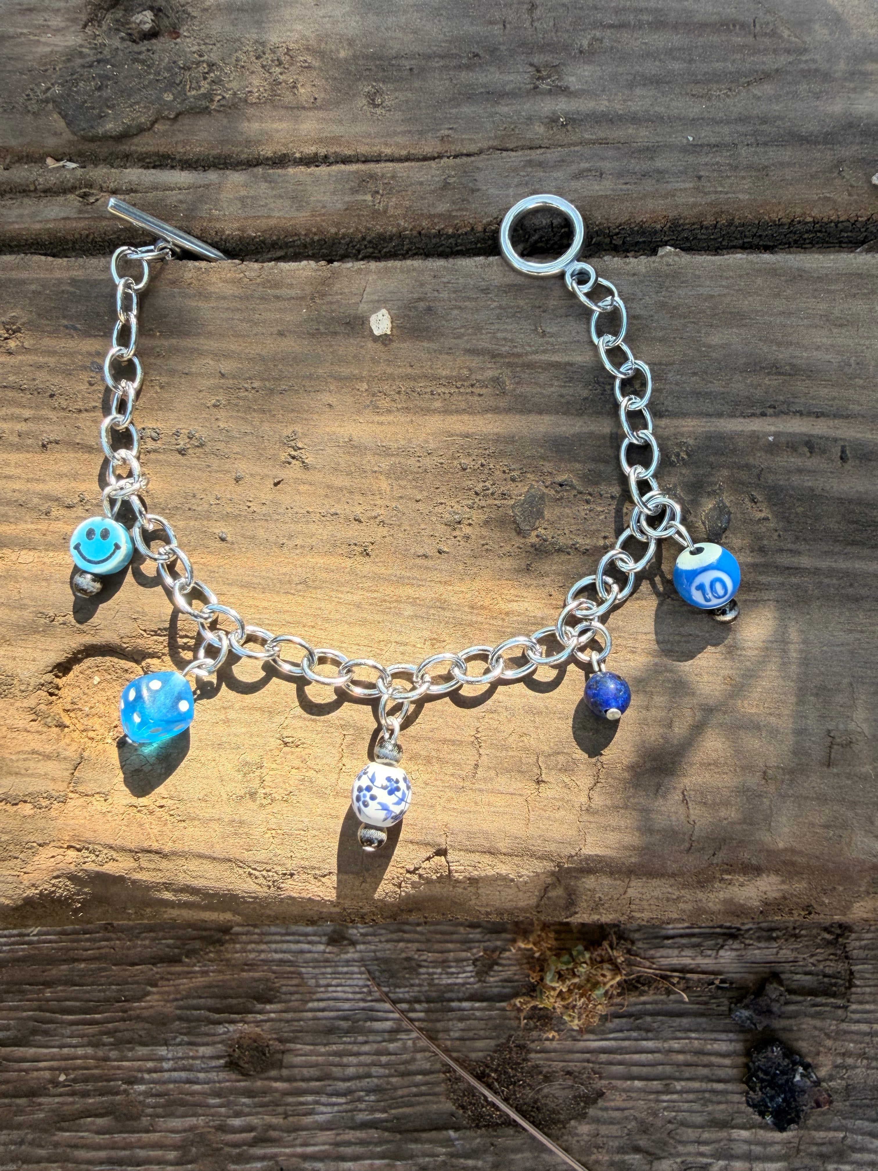 dark blue themed charm bracelet