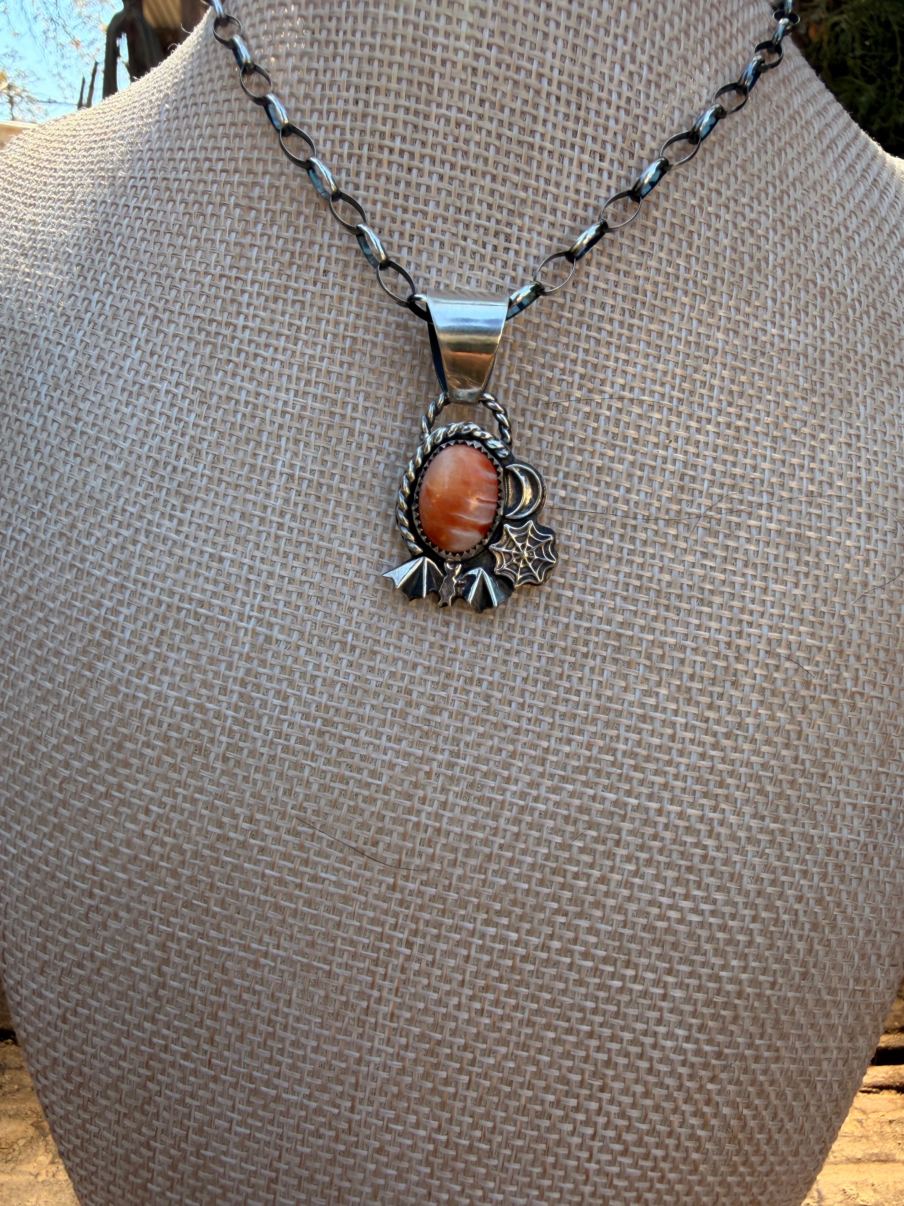 orange spiny halloween chaos pendant