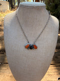 orange spiny and black onyx pendant necklace