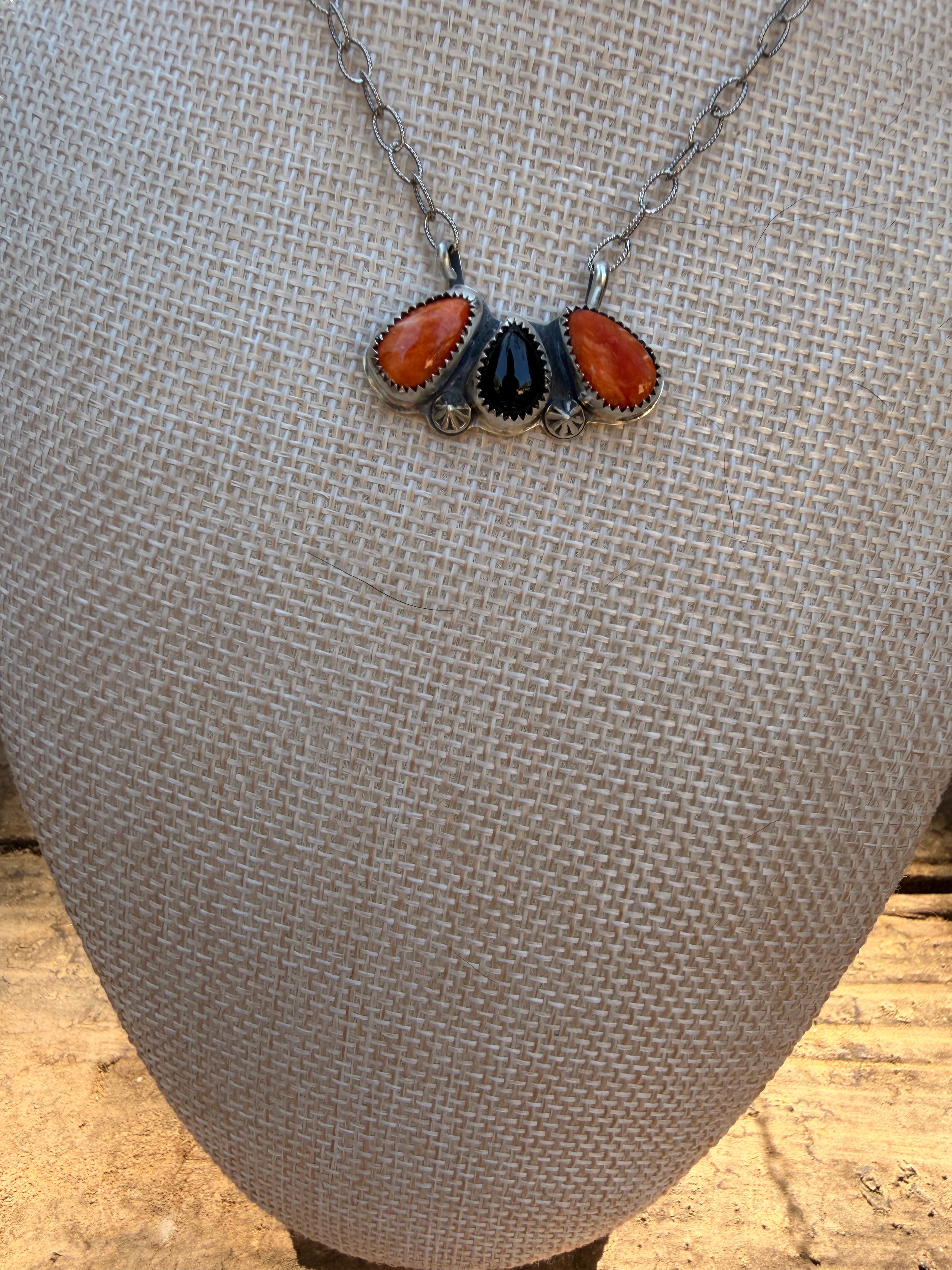 orange spiny and black onyx pendant necklace